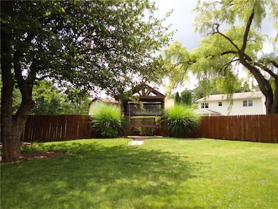 The entire back yard is fenced, along with an amaz