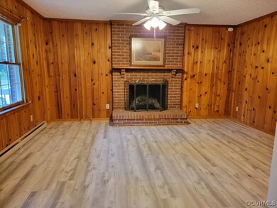 Open to Living Room, LPV flooring, gas fireplace