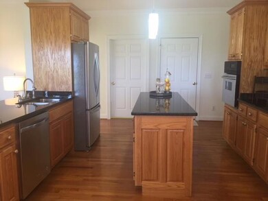 KITCHEN - S.S. APPLIANCES/GRANITE COUNTER TOP