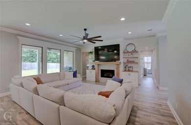 Beautiful open wooden shelves, custom cabinets, an