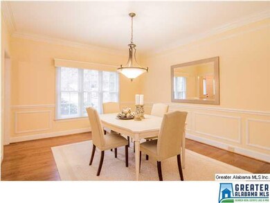 Formal dining room with beautiful moldings and gle
