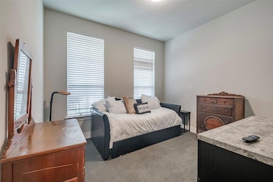 Bedroom with carpet