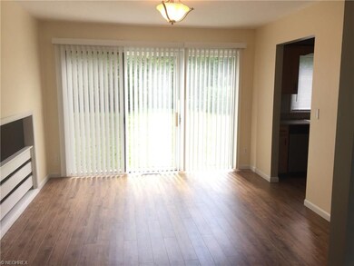 The dining room opens to the living room, the kitchen, in the family room in the lower level