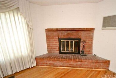 Raised hearth brick fireplace