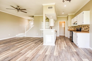 View from dining area to living and kitchen
