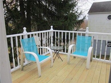 private deck off den/family room with French doors