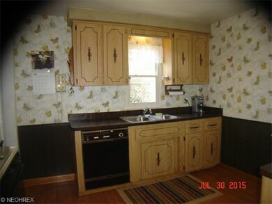 Kitchen has four different work areas--all with ca
