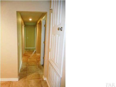 view of hallway leading to the four bedrooms