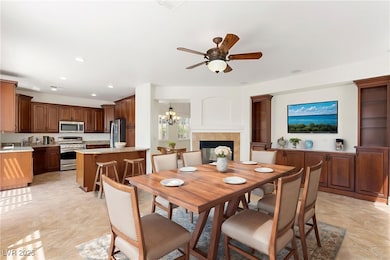 Dining room featuring a ceiling fan, recessed ligh
