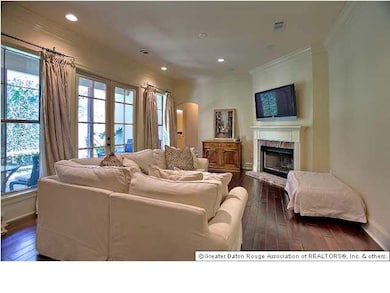 View of Living room from the kitchen. Windows over