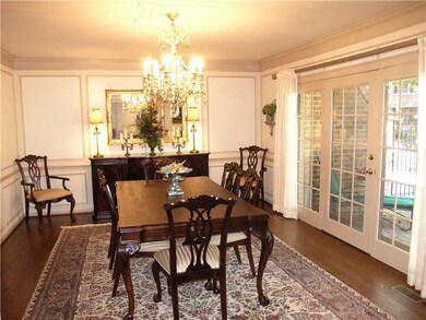 Dining Room. Classic hardwood flooring underscores