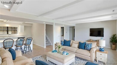 Lower level living-room staged.