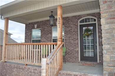 Enjoy the covered front porch.