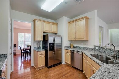 The kitchen has 42” upper cabinets, beautiful granite and Stainless Steel appliances and a lot of surfaces to work with.