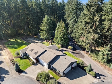 Home nestled into park like setting.