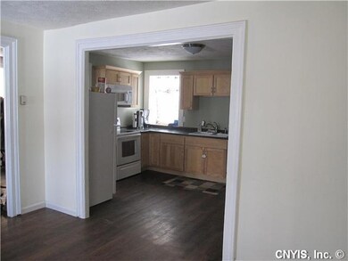 Kitchen. Archway into kitchen. Archway to the left