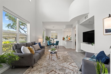 Expansive windows bring in marina views and light