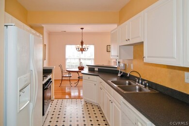ROOMY KITCHEN W/ PLENTY OF STORAGE & COUNTER SPACE