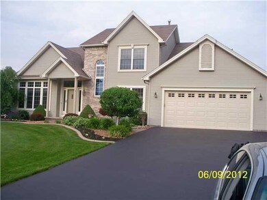 Exterior Front. Beautiful landscaping draws you up