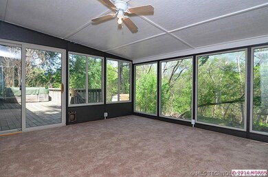 Roomy Florida room looks out to the greenbelt!