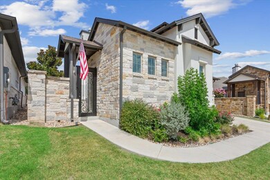 View of property exterior with stone siding, a la
