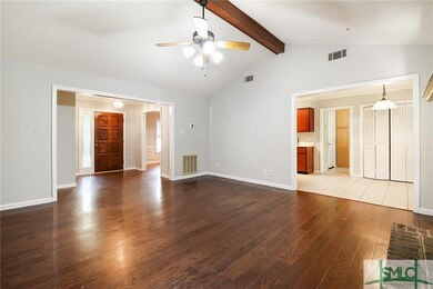 Standing in the living room, to the left is the fo