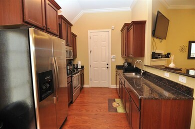 The kitchen comes equipped with SS appliances incl