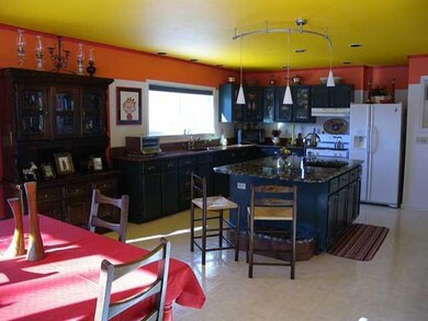 Kitchen The 15 x16  modern kitchen has plenty of c