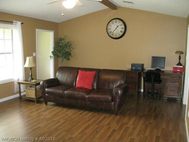 Living Room. Spacious living area featuring an exp