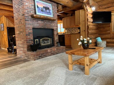 Front room with wood burning fireplace
