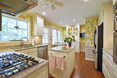 Bright, sunny Kitchen with white cabs