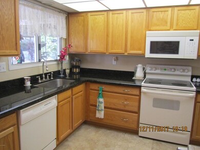 Applianced kitchen with newer cabinets