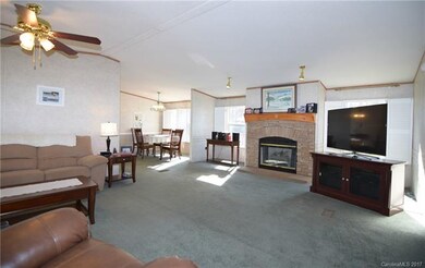 Spacious great room with wood burning fire place