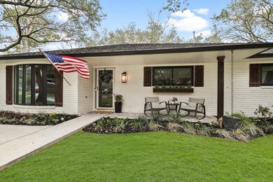 The extended & covered front porch supported by a wood-stained decorative column offers space for outdoor furniture, includes updated coach lantern lighting, brick flooring (2022), a glass storm door and a Ring video door bell. Large side yards & gated access to the backyard is included and the heating & air conditioning system was just replaced in 2022 and includes a Nest digital thermostat.