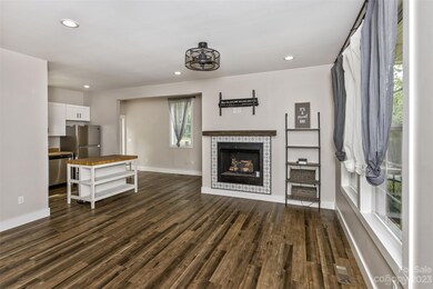 Spacious living room with a gas log fireplace