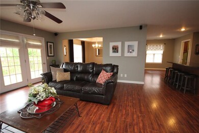 Living Room is open to Kitchen and Formal Dining R