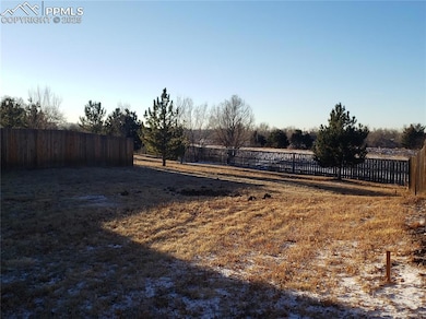 The rear potion of the lot and common space behind.