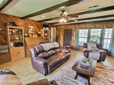 Living room with fireplace/Primary home