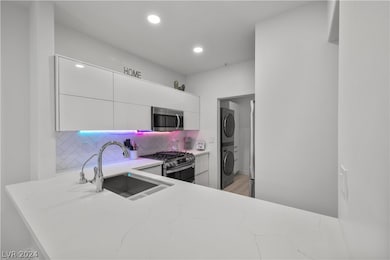 7107 S Durango Dr unit 203, Las Vegas, NV 89113 - photo 2