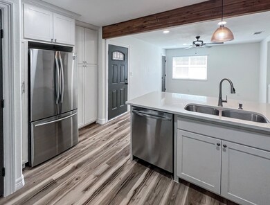 Bright kitchen with a seamless flow to the living