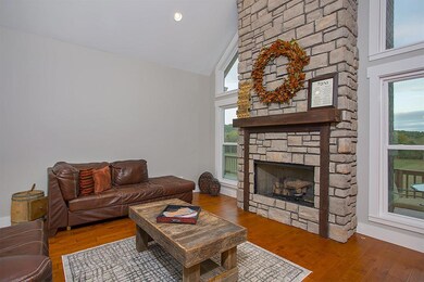 Warm up by this gorgeous fireplace. 