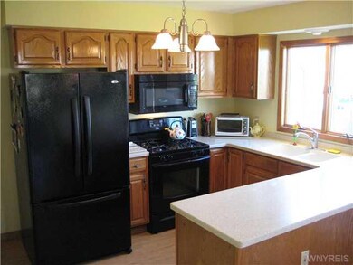 Kitchen. Kitchen features updated Corian counterto