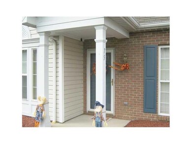 Entry/Foyer. Front entry shielded from foul weathe