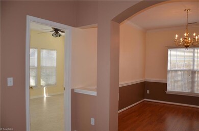 View looking from Great room into SunRoom and Dining Room.
