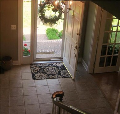 Amazing two story entry!  Gorgeous tile!  Home offers a very inviting floor plan, spacious rooms, dual stairways,  Immaculate condition!!