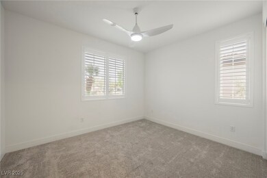 Unfurnished room with carpet and ceiling fan