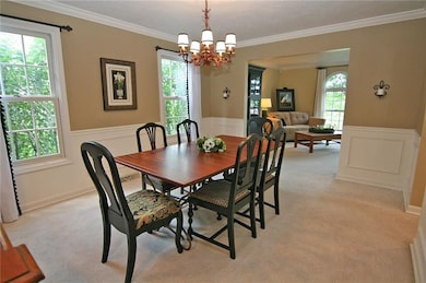 The living room is open to the dining room for an 