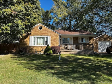 View of front of house with brick siding and a porch