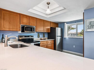 Kitchen with pendant lighting, sink, stainless ste