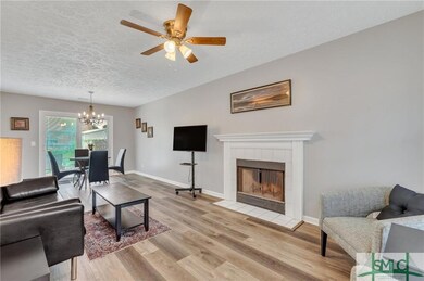 Wood Burning Fireplace & Two Chairs